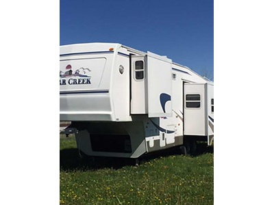 2003 Forest River Cedar Creek w/3 slides