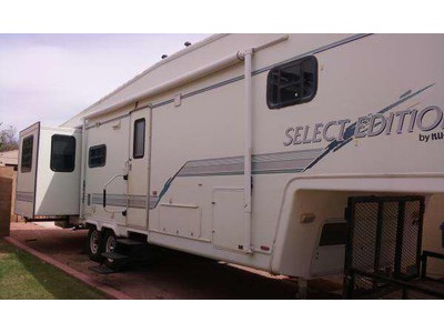 1996 34ft. Nu-Wa Shnowbird w/3 slides