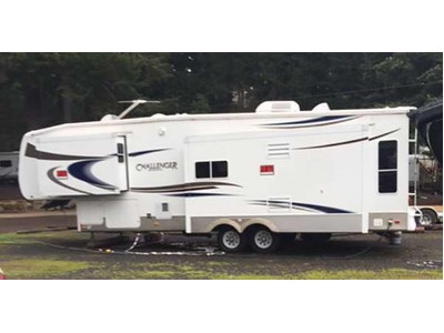 2007 35ft. Keystone Challenger w/3 slide