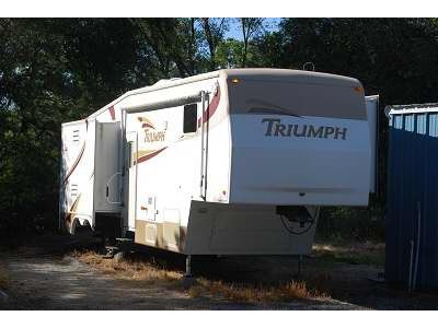 2002 33.5� Triumph 335G w/3 slides